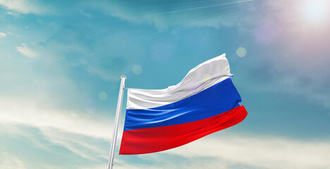 Russia national flag waving with beautiful sky.