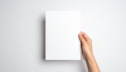 Fototapeta premium hands holding blank paper