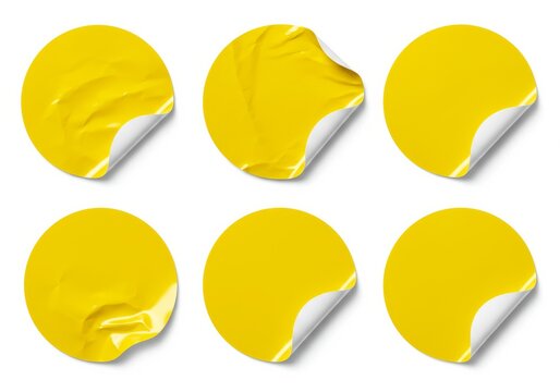 Group of wrinkled yellow circular stickers