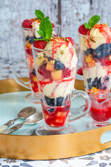 Knickerbocker glory - layered ice cream sundae with fresh fruit
