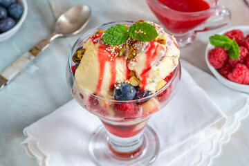 Knickerbocker glory - layered ice cream sundae with fresh fruit