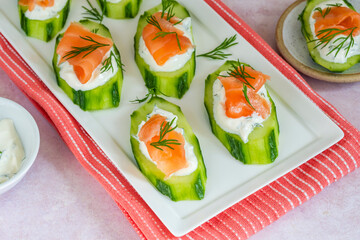 Cucumber and smoked salmon bites with sour cream and dill
