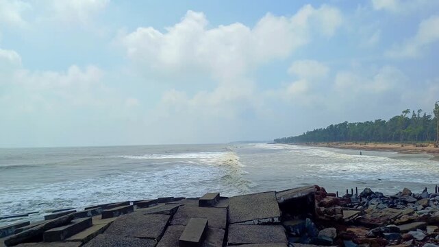 Waves of Bay of Bengal reaching beach in Digha