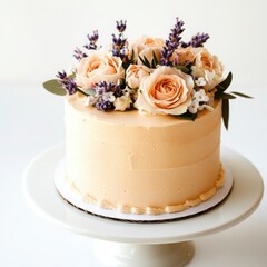 single-layer birthday cake with smooth matte buttercream in a soft peach hue, topped with fresh edible flowers