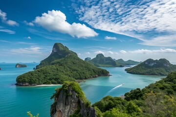 Stunning panoramic view of emerald waters and lush green limestone karsts in a tropical island paradise