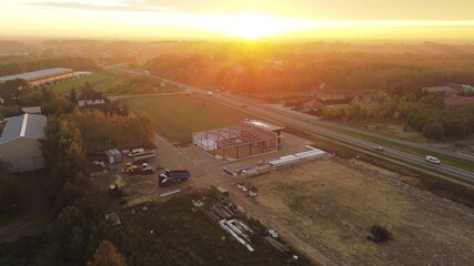 Fototapeta premium Industrial building under construction in countryside