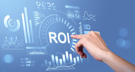 Hand pointing at ROI interface with digital charts and graphs on blue background representing business analytics and investment return concept.