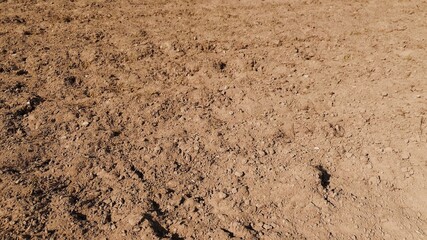Aerial view of freshly plowed farmland ready for the next planting season