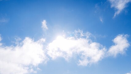 Tranquil Daytime Sky with Golden Sunset and Cloud Layers