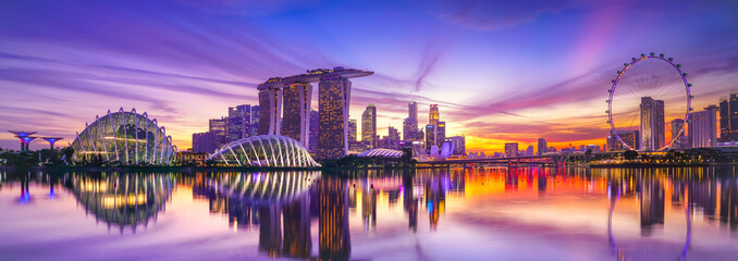 View of the skyline at the Downtown Core along Marina Bay at dusk in Singapore. © Javen