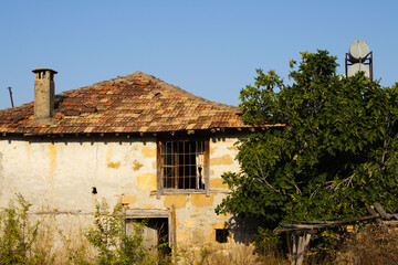 Abandoned Rural House with Satellite Dish
