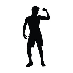Silhouette of a Fit Man Flexing His Muscles in a Strong Pose