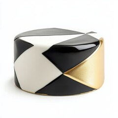 A modern birthday cake with a smooth black and white geometric design
