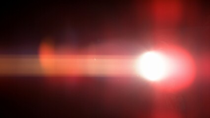 Abstract background of real lens flare for overlay or transition