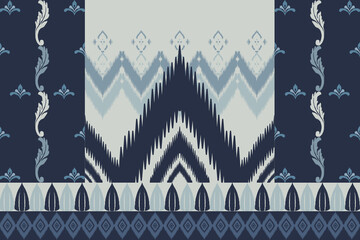 Seamless indigo ikat patterns in ethnic tribal style, featuring geometric diamond shapes and woven texture in blue tones.