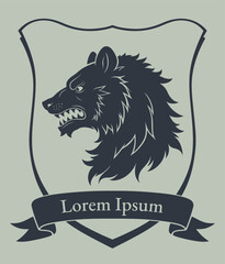 Vector heraldic bear head in the shield with ribbon and lettering.
