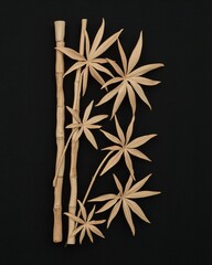 Young museum unique carving bamboo leaf art on plain black background