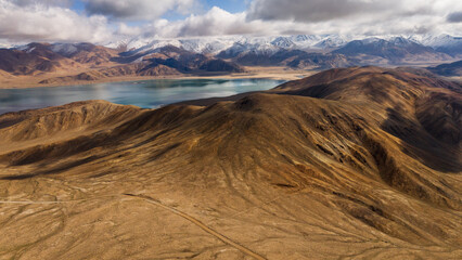 aerial view of Yashilkul lake in Gorno Badakhshan Autonomous Province, Tajikistan Pamir highway Mountain scenic landscape Bulunkul village Central Asia 