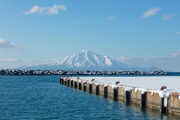 Mount Rishiri in winter as seen from Nukakai Fishing Port