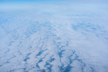Obraz premium Blue sky with white clouds, flying above cloudy sky texture pattern, cloudscape blurred light