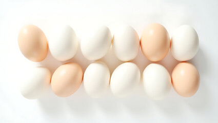 eggs on a white surface, showcasing natural texture and subtle shadows in a minimalist composition.