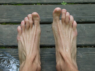Man's feet with a lot of sweat on them