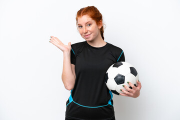 Young caucasian reddish football player woman isolated on white background having doubts while...