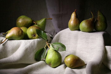 Pear. Pears are laid out on a textured linen fabric
