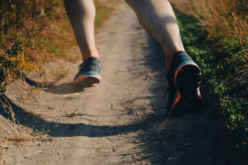 Man is training, running, warming up outdoor.