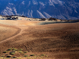 Volcano landscape with desert among mountains.