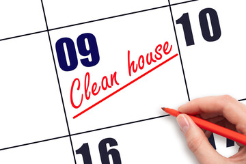 9th day of the month.  Hand writing Clean house reminder and drawing a line on calendar with red...