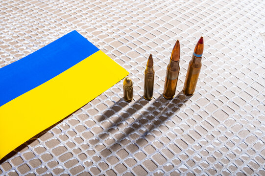Ukraine Flag with Ammunition Ukraine Defense and Arms Production Concept