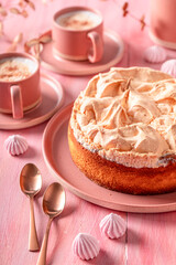 Tasty meringue cheesecake served with frappuccino coffee
