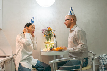 Here's a title following your specifications: Birthday Couple Kitchen Celebration: Intimate...