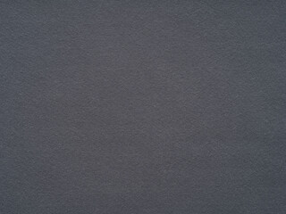 A dark charcoal felt canvas whispers mystery, offering a deep, velvety texture that invites...