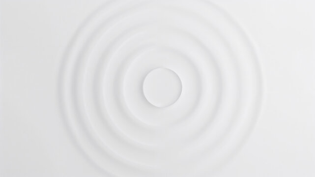 White concentric ripples expanding on liquid surface creating relaxing pattern