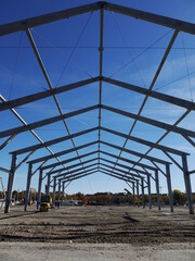 Large building with a blue sky in the background