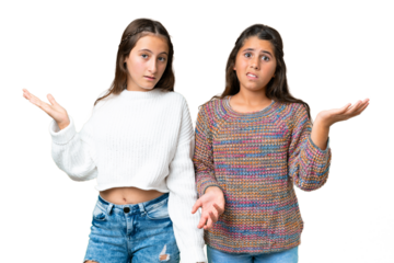 Friends girls over isolated chroma key background having doubts and with confuse face expression