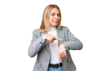 Young pretty blonde woman over isolated chroma key background making the gesture of being late