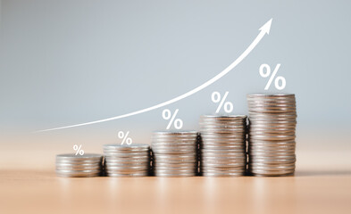 stack of silver coins with trading chart in financial concepts and financial investment business...