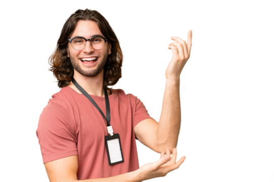 Young handsome man with ID card over isolated background extending hands to the side for inviting to come