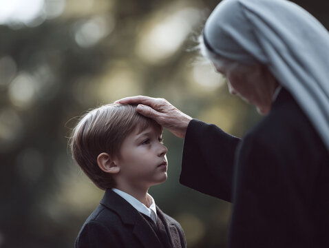A nun gently places her hand on a young boys head, symbolizing faith, guidance, and generational connection. Suitable for themes of religion, childhood, and care.