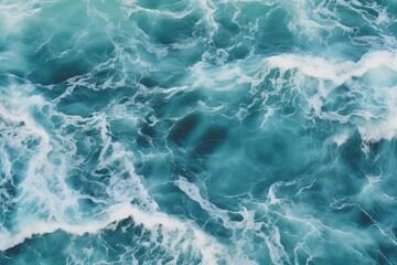 Fototapeta premium Beautiful turquoise ocean water with white waves creating a soothing and mesmerizing seascape