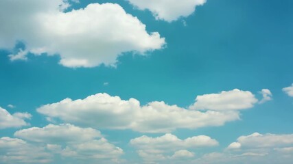 Fluffy white clouds drift across a vibrant blue sky, suggesting clear weather and open possibilities. - Powered by Adobe