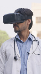 Vertical Photo of Indian Doctor Looking Right VR headset, Virtual Reality  