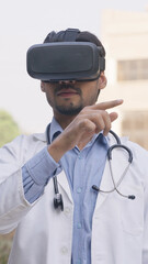 Vertical Photo of Indian Doctor Working in VR Headset, Virtual Reality