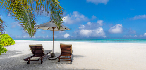 Romantic summer beach scene with chairs umbrella under sunny sky tropical leisure lifestyle vacation tourism holiday destination ocean view palm trees relaxation travel background resort coast