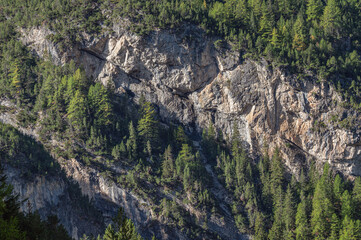 autumnal mountain landscape inside the Stelvio National Park along the Lombard side, Sondrio, Italy