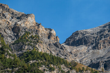 autumnal mountain landscape inside the Stelvio National Park along the Lombard side, Sondrio, Italy