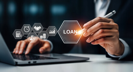 A business professional uses a stylus to interact with a digital interface displaying loan and financial icons, signifying business finance and planning